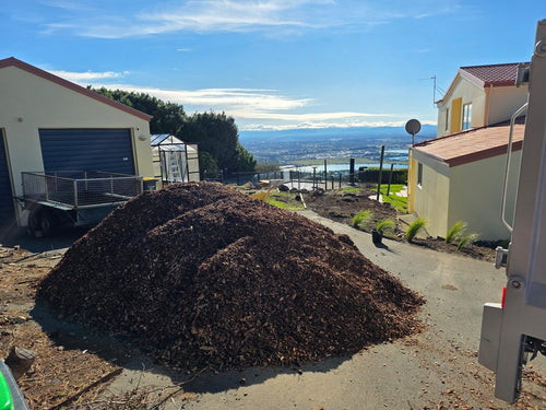 8m³ bulk aged mulch delivery tipped on a residential driveway in Christchurch
