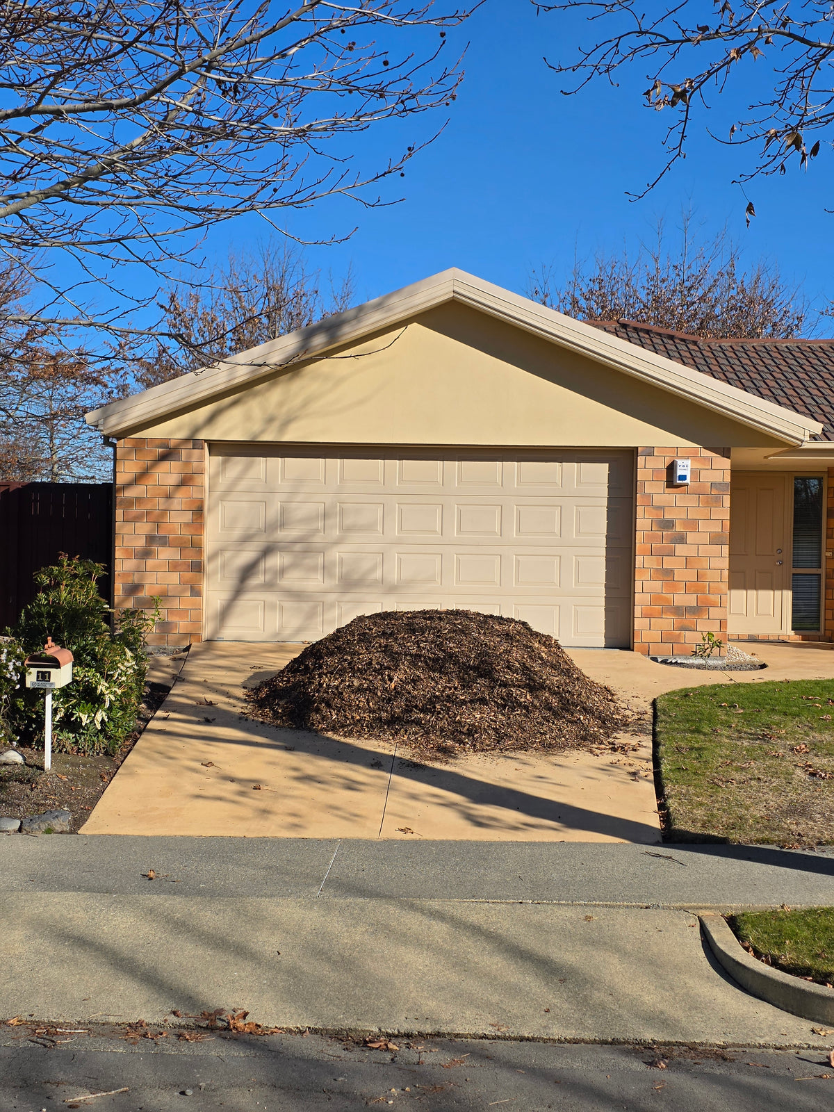 2m³ load of aged garden mulch delivered to a Christchurch residential driveway
